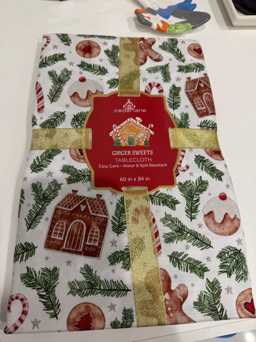 CedarLane Ginger Sweets Holiday Tablecloth — White with Green/Red/Brown Motif